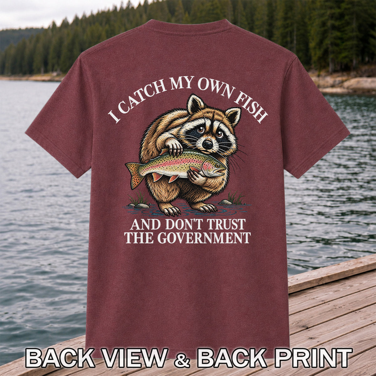 Raccoon Holding Rainbow Trout Fishing Graphic T-Shirt | Back Print