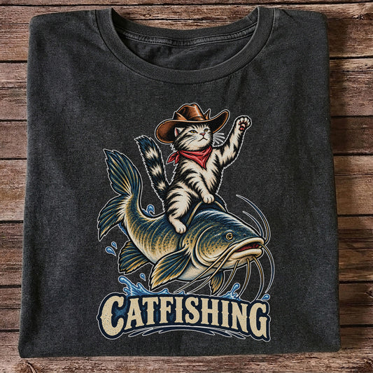 Catfishing Cowboy Cat Riding a Catfish Graphic T-Shirt