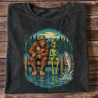 Bigfoot and Alien Fishing on a Dock with Rainbow Trout Graphic T-Shirt