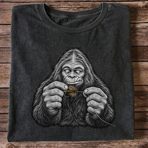 Bigfoot Tying a Fly Fishing Lure Graphic T-Shirt