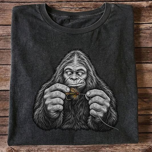 Bigfoot Tying a Fly Fishing Lure Graphic T-Shirt