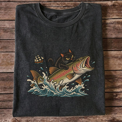 Black Cat Riding a Trout Ocean Wave Fishing Graphic T-Shirt