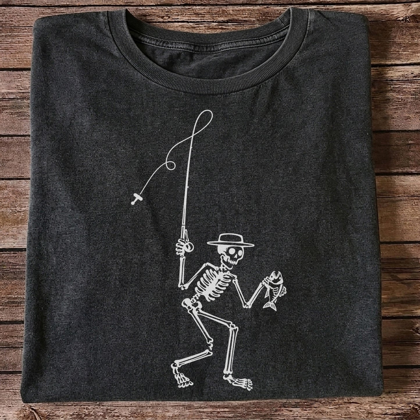 Skeleton Angler Holding a Fish Line Art Fishing T-Shirt