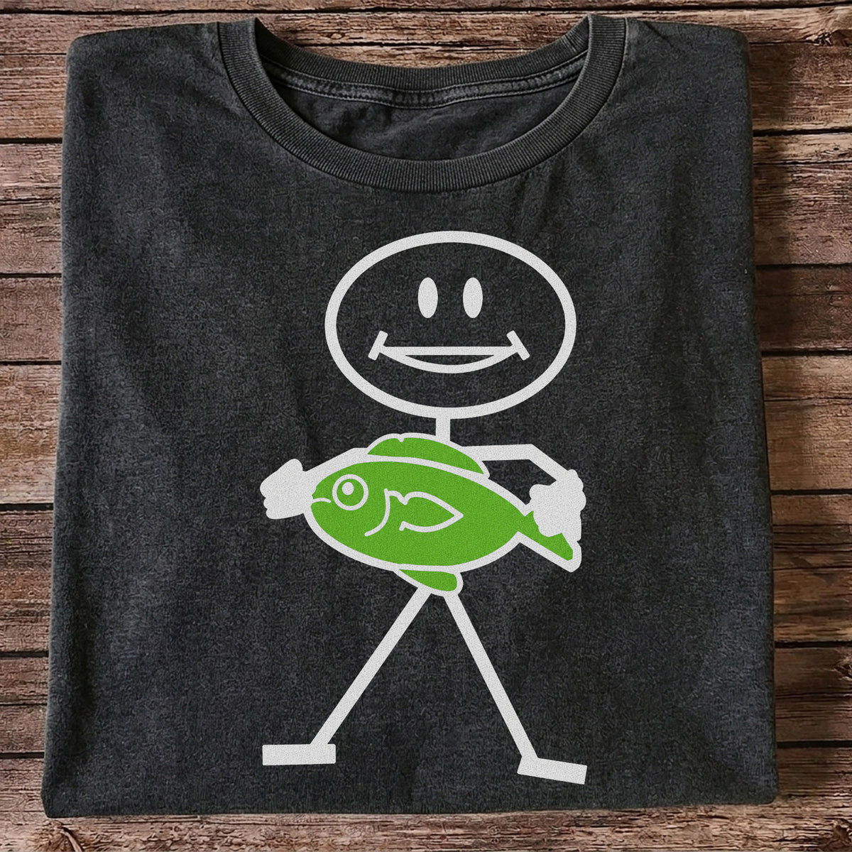 Happy Stick Figure Holding a Green Fish Graphic T-Shirt