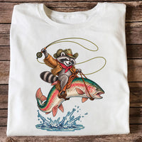 Cowboy Raccoon Riding a Rainbow Trout Fishing Graphic T-Shirt