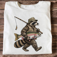 Raccoon Angler Holding Rainbow Trout Fishing Graphic T-Shirt