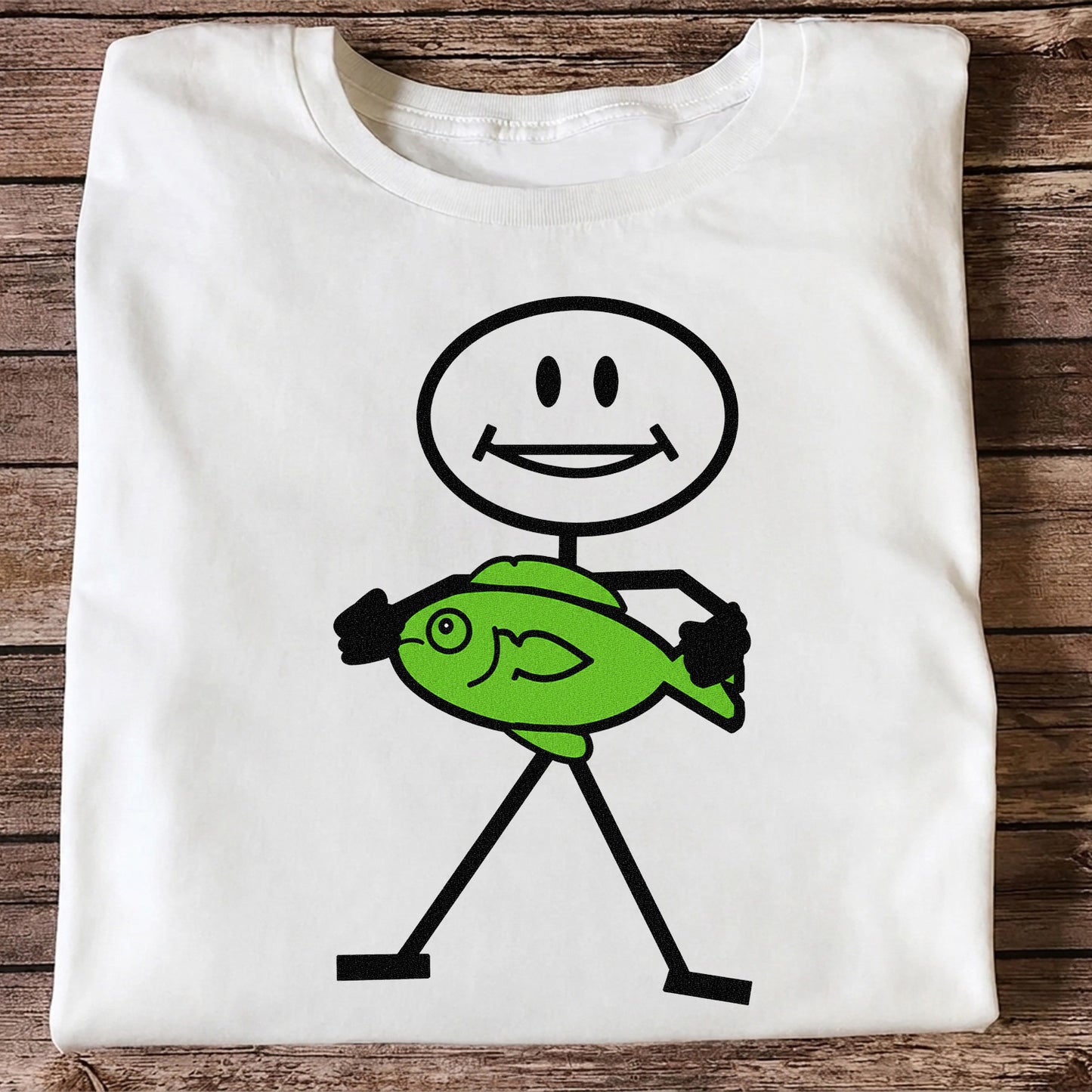 Happy Stick Figure Holding a Green Fish Graphic T-Shirt