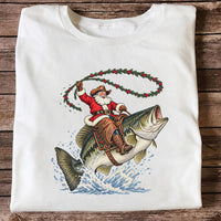 Cowboy Santa Riding a Jumping Bass Christmas Fishing Graphic T-Shirt