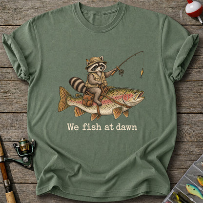 We Fish at Dawn Raccoon Riding a Rainbow Trout Fishing T-Shirt