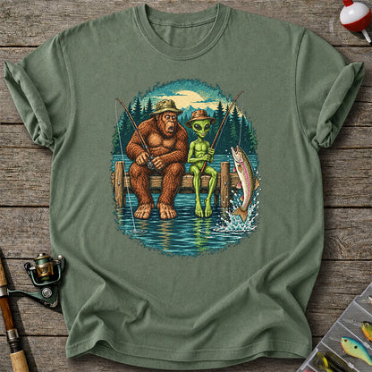Bigfoot and Alien Fishing on a Dock with Rainbow Trout Graphic T-Shirt