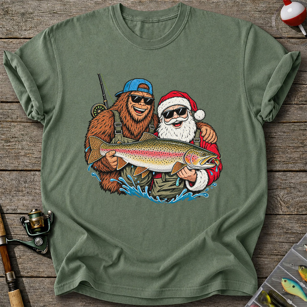 Bigfoot and Santa Holding Rainbow Trout Christmas Fishing Graphic T-Shirt