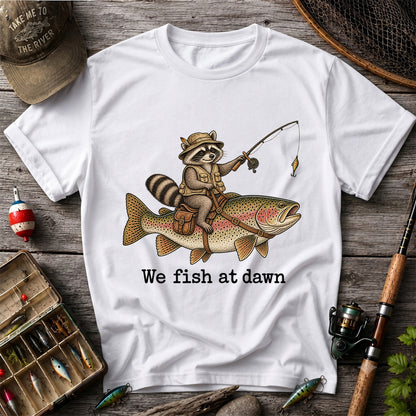 We Fish at Dawn Raccoon Riding a Rainbow Trout Fishing T-Shirt