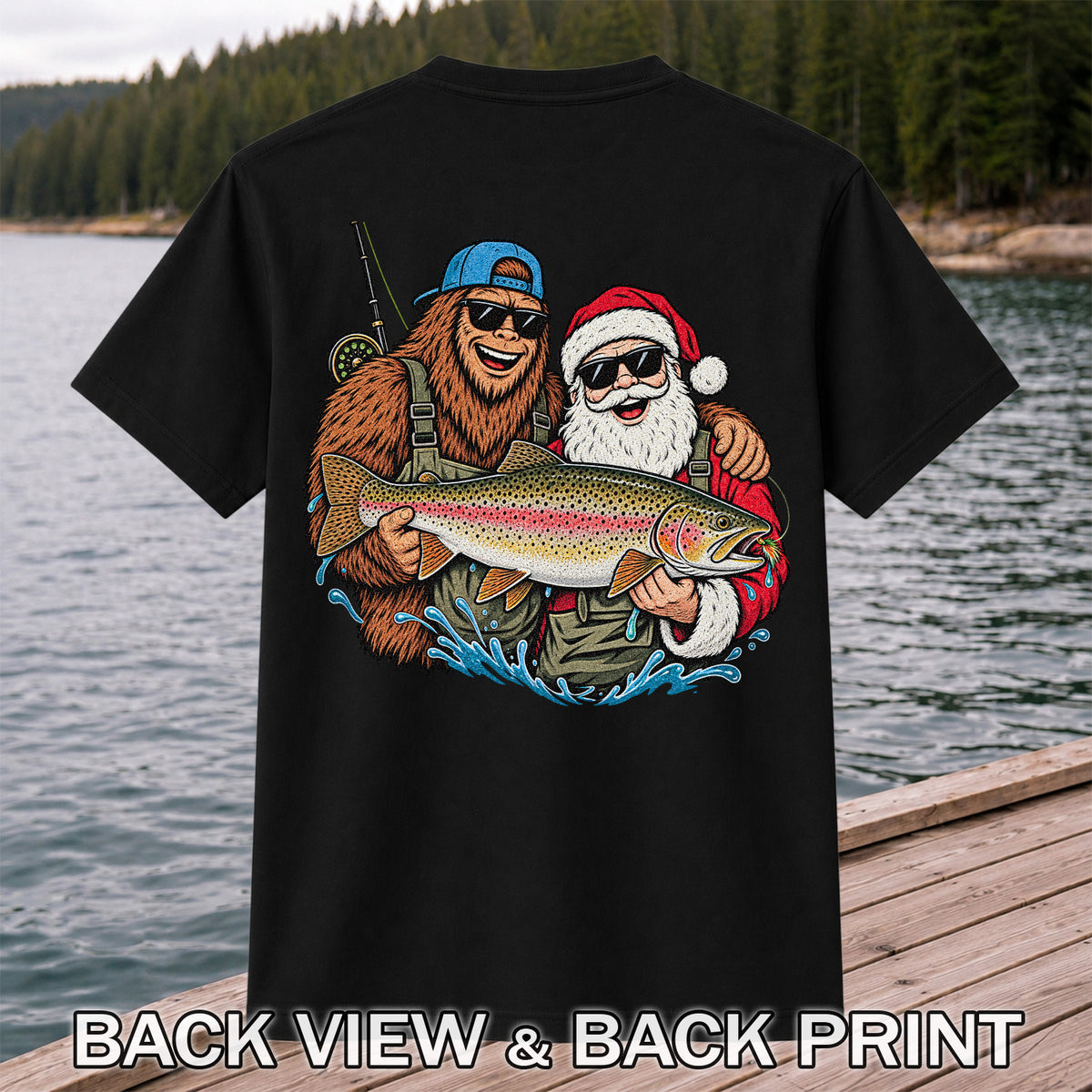 Bigfoot and Santa Holding Rainbow Trout Christmas Fishing Graphic T-Shirt | Back Print