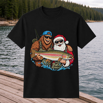 Bigfoot and Santa Holding Rainbow Trout Christmas Fishing Graphic T-Shirt