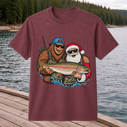 Bigfoot and Santa Holding Rainbow Trout Christmas Fishing Graphic T-Shirt