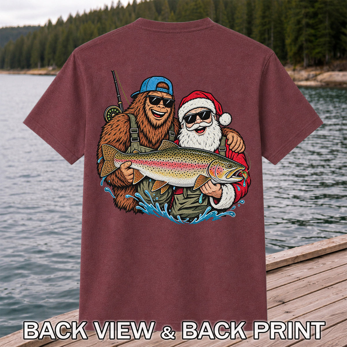 Bigfoot and Santa Holding Rainbow Trout Christmas Fishing Graphic T-Shirt | Back Print