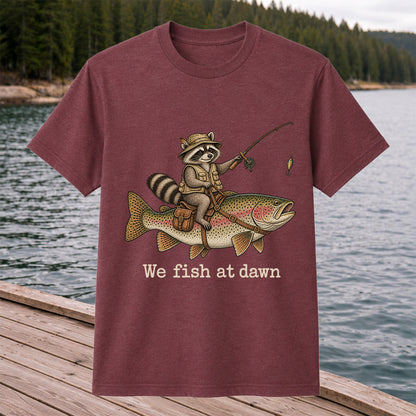 We Fish at Dawn Raccoon Riding a Rainbow Trout Fishing T-Shirt