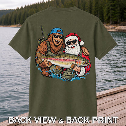 Bigfoot and Santa Holding Rainbow Trout Christmas Fishing Graphic T-Shirt | Back Print