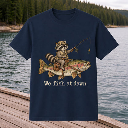 We Fish at Dawn Raccoon Riding a Rainbow Trout Fishing T-Shirt