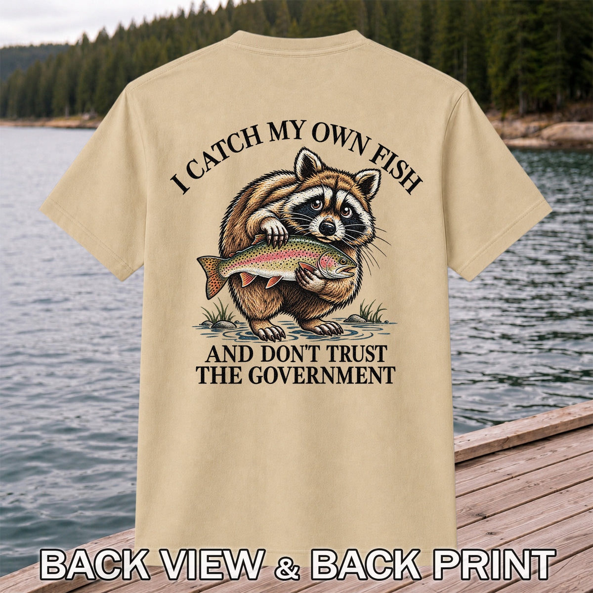 Raccoon Holding Rainbow Trout Fishing Graphic T-Shirt | Back Print