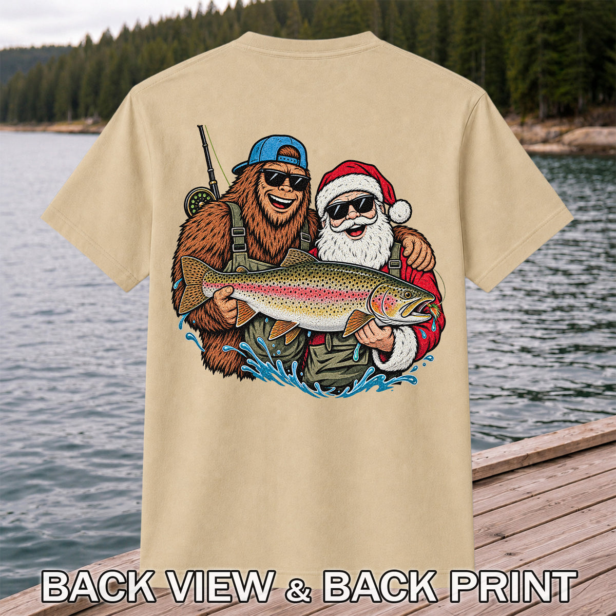 Bigfoot and Santa Holding Rainbow Trout Christmas Fishing Graphic T-Shirt | Back Print