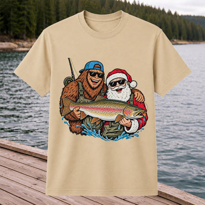 Bigfoot and Santa Holding Rainbow Trout Christmas Fishing Graphic T-Shirt