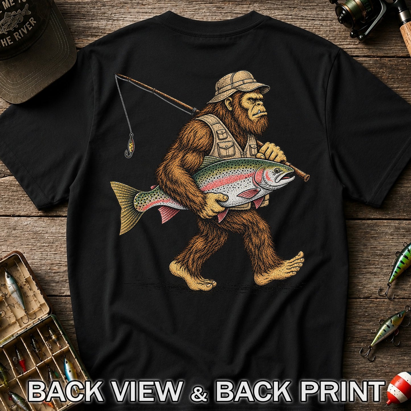 Bigfoot Carrying a Rainbow Trout and Fishing Rod Graphic T-Shirt | Back Print