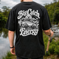 Big Catch Energy Bear Holding Trout Fishing T-Shirt | Back Print