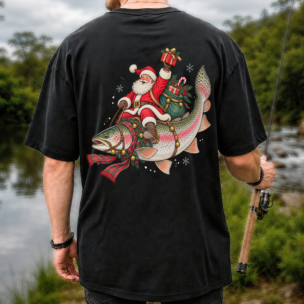 Santa Riding a Festive Rainbow Trout Christmas Fishing Graphic T-Shirt | Back Print