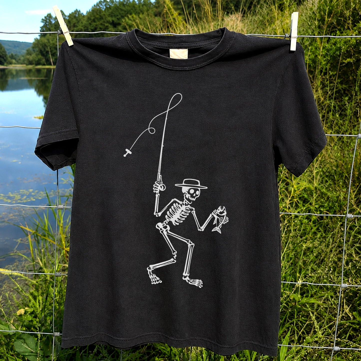 Skeleton Angler Holding a Fish Line Art Fishing T-Shirt