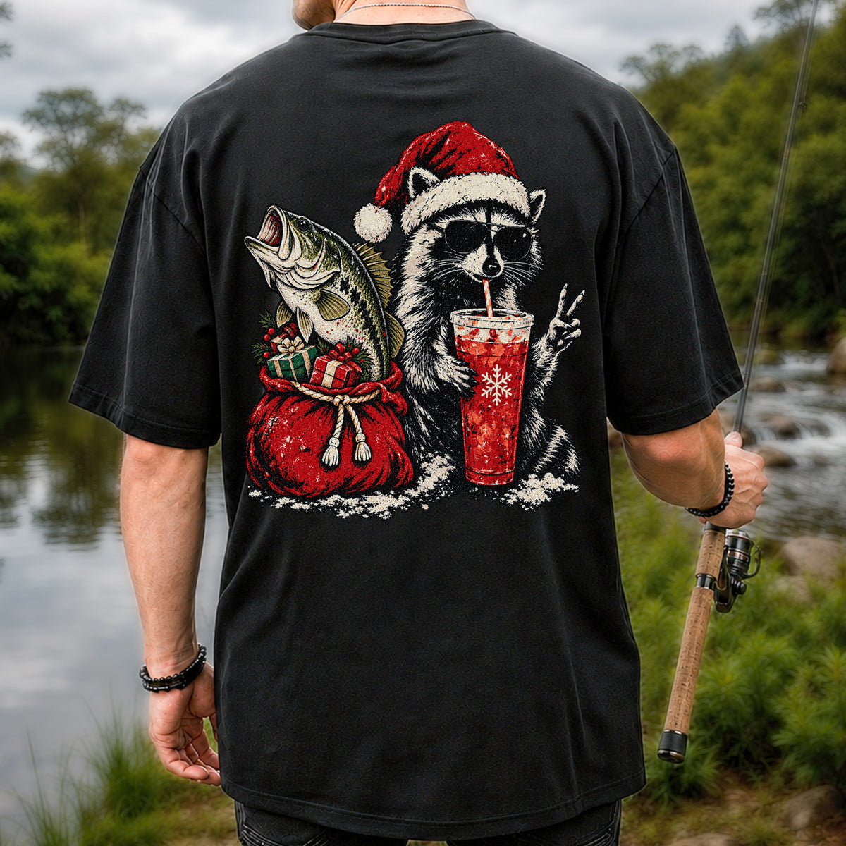 Santa Raccoon Sharing a Bass Christmas Fishing Graphic T-Shirt | Back Print