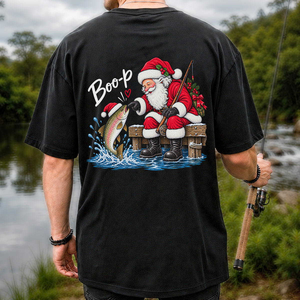 Santa Fishing for Rainbow Trout Christmas Graphic T-Shirt | Back Print