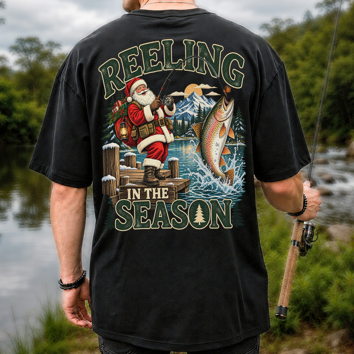 Reeling in the Season Santa Fishing for Rainbow Trout Christmas T-Shirt | Back Print