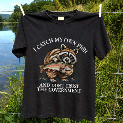 Raccoon Holding Rainbow Trout Fishing Graphic T-Shirt
