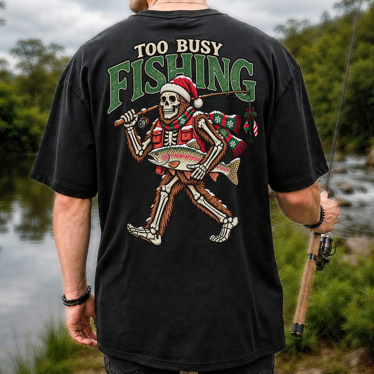 Too Busy Fishing Bigfoot Skeleton Christmas Trout T-Shirt | Back Print