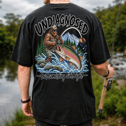 Undiagnosed But Something Ain't Right Bigfoot Trout Fishing T-Shirt | Back Print