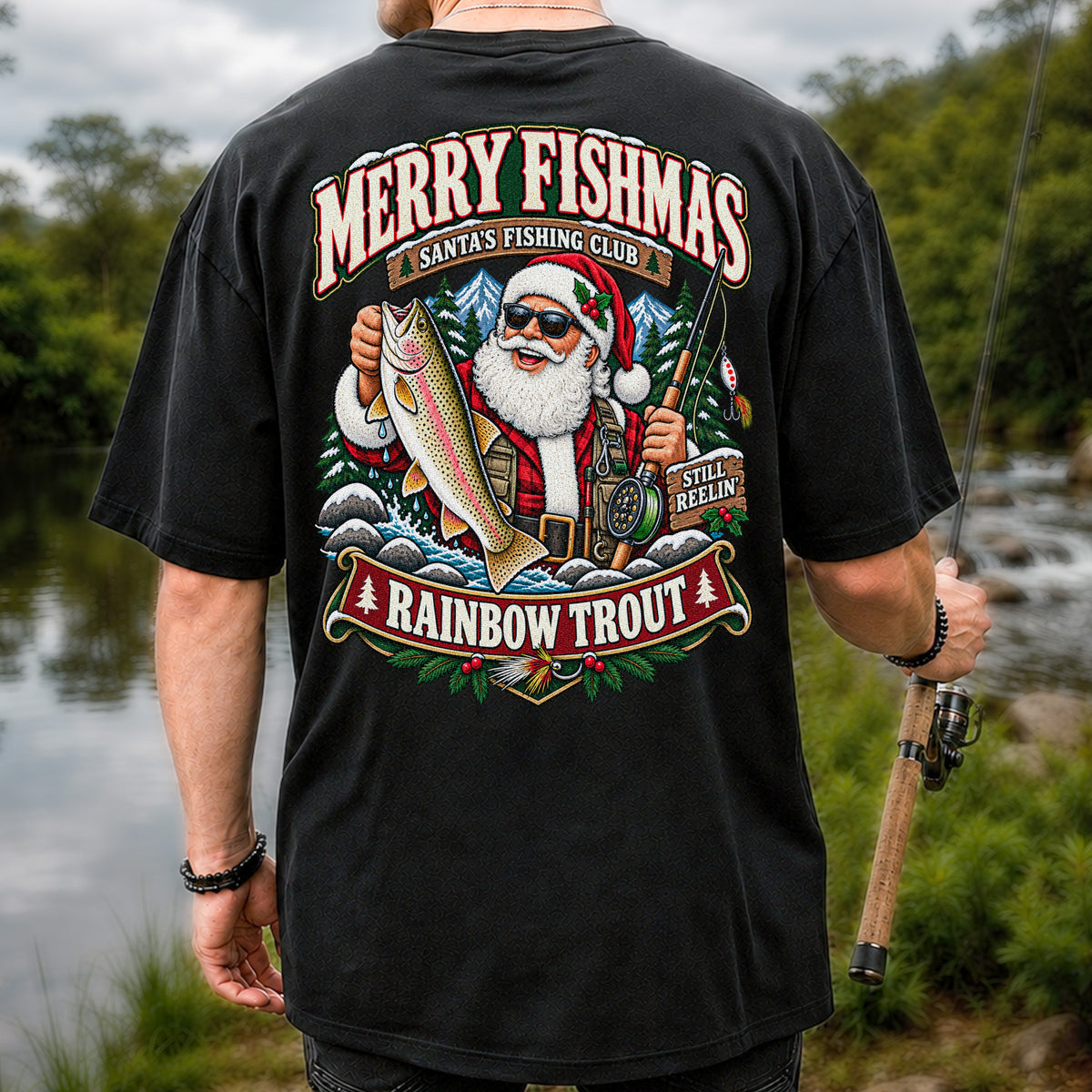 Merry Fishmas Santa's Fishing Club Still Reelin' Rainbow Trout Christmas T-Shirt | Back Print