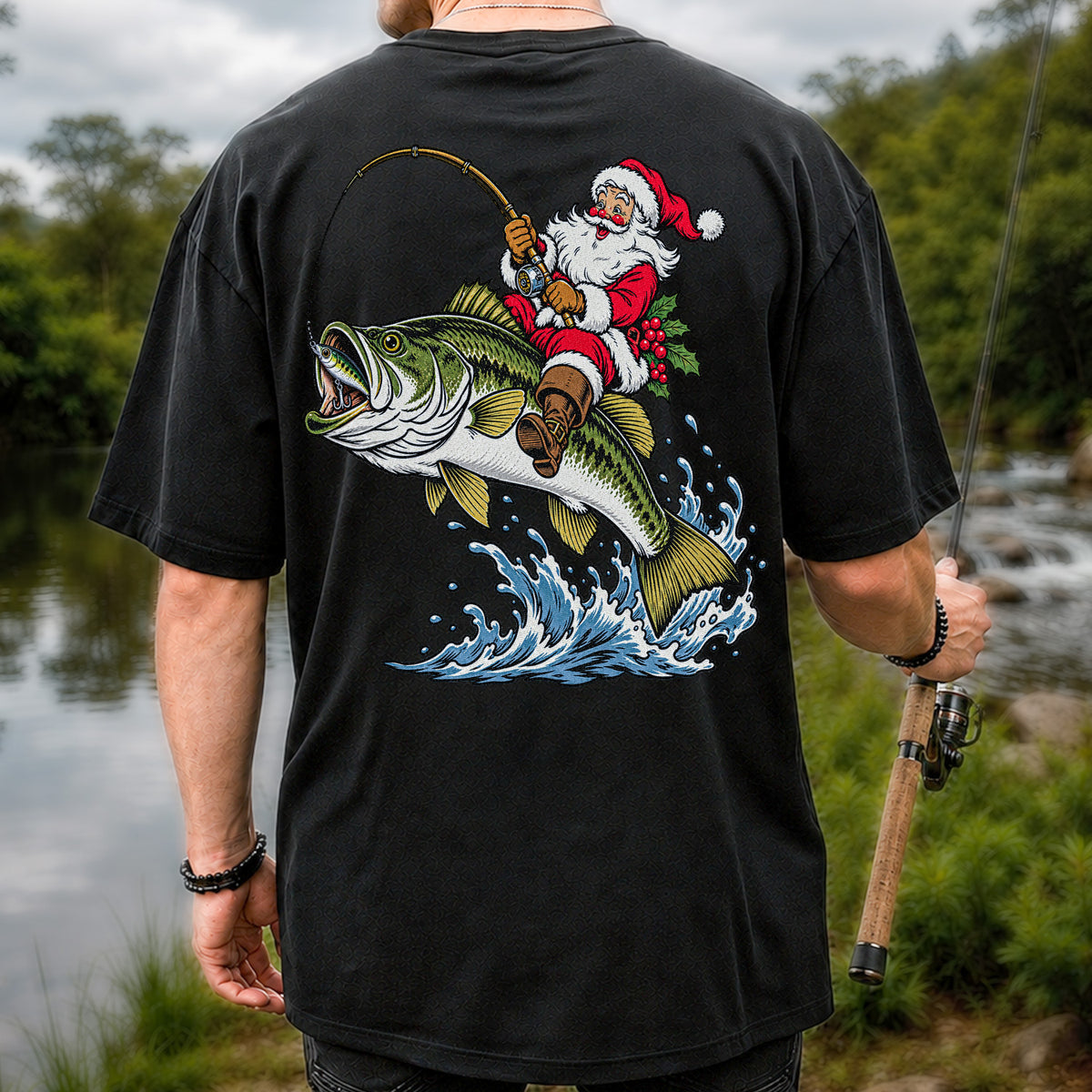 Santa Claus Riding a Bass Christmas Fishing Graphic T-Shirt | Back Print