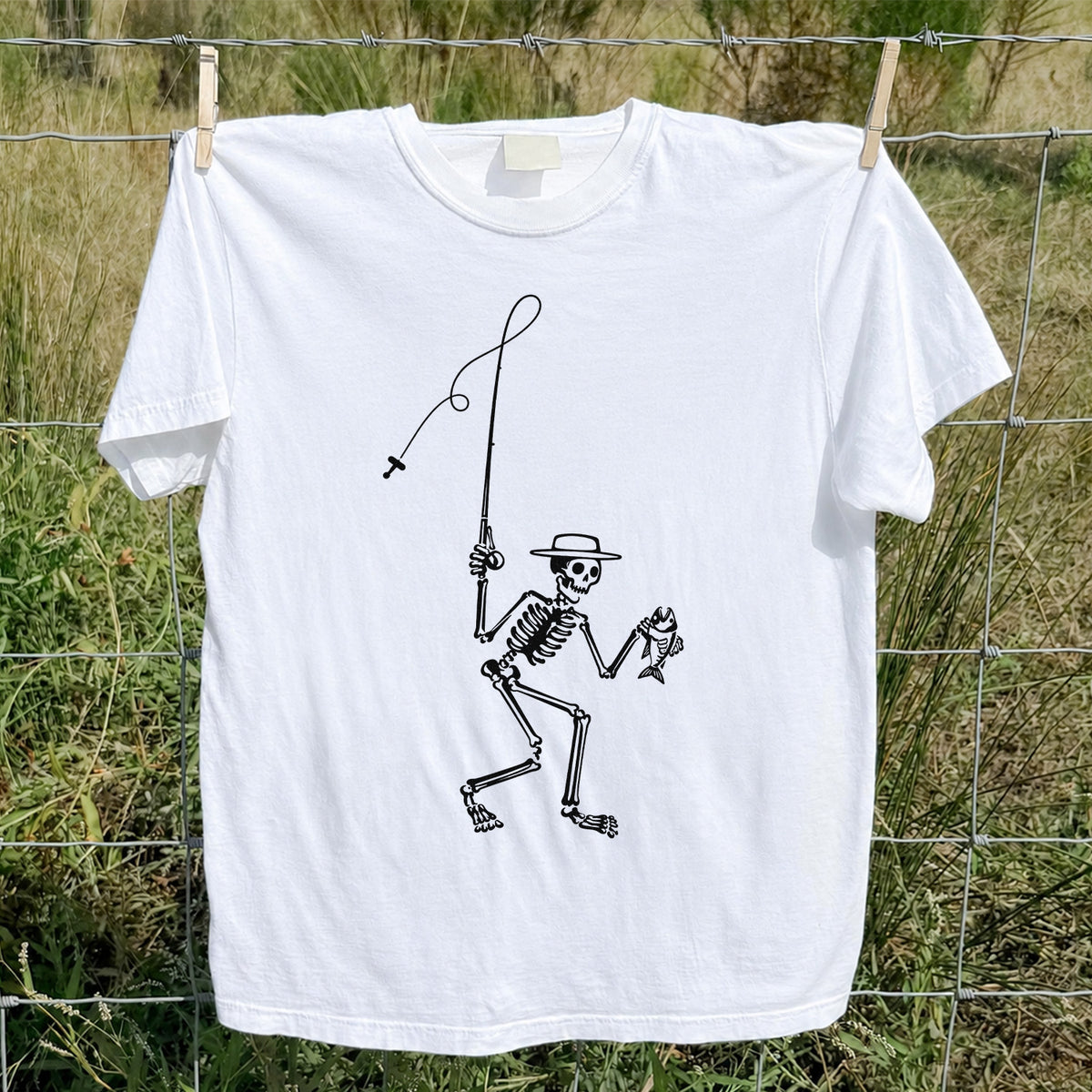 Skeleton Angler Holding a Fish Line Art Fishing T-Shirt