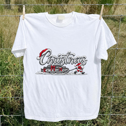 Christmas Santa Pulling Trout Fishing Sled Graphic T-Shirt