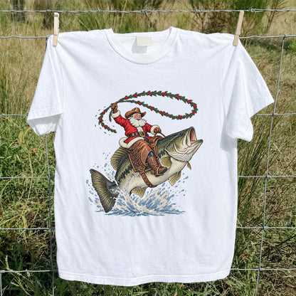 Cowboy Santa Riding a Jumping Bass Christmas Fishing Graphic T-Shirt