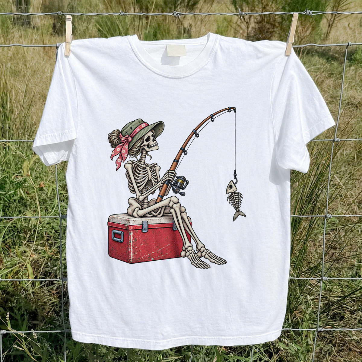 Skeleton Woman Fishing on a Cooler with Fish Bones Graphic T-Shirt