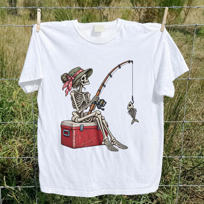 Skeleton Woman Fishing on a Cooler with Fish Bones Graphic T-Shirt