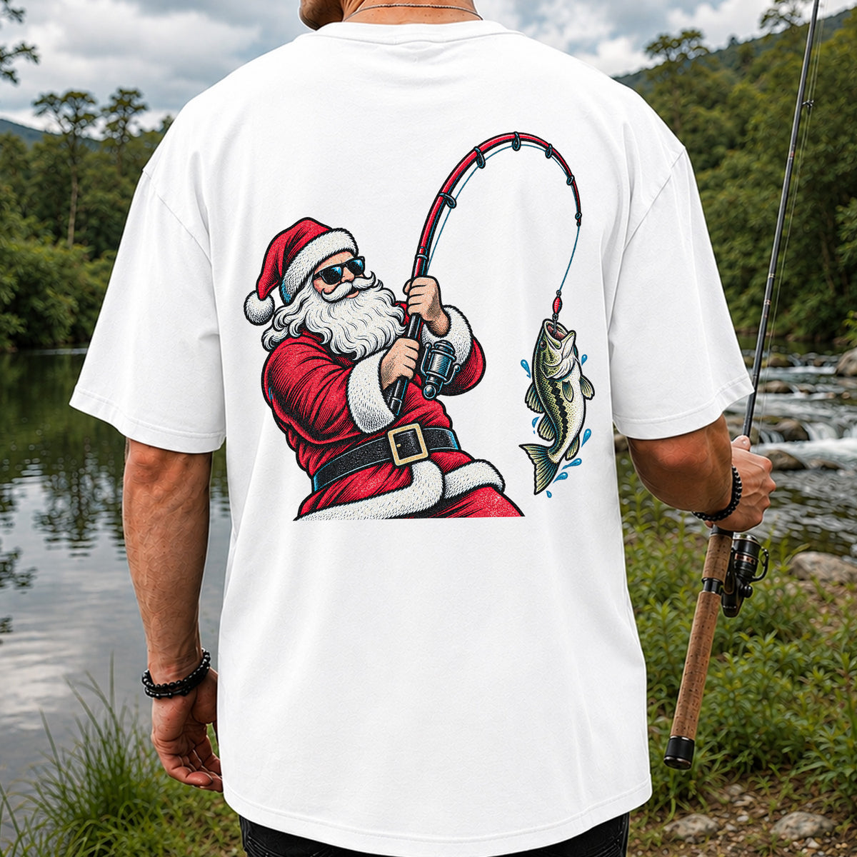 Santa Claus Catching a Bass Christmas Fishing Graphic T-Shirt | Back Print