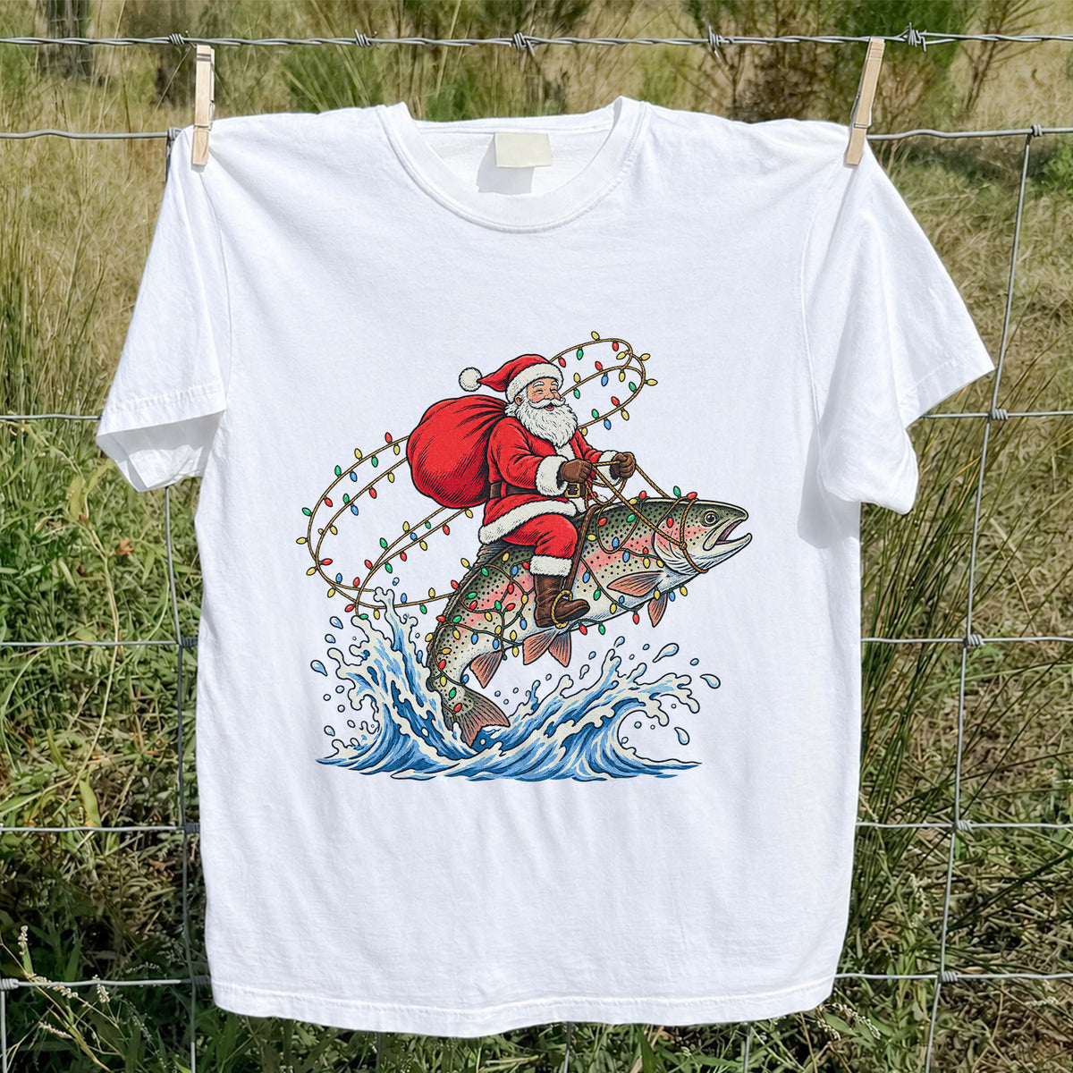 Santa Riding a Christmas-Lighted Rainbow Trout Fishing Graphic T-Shirt