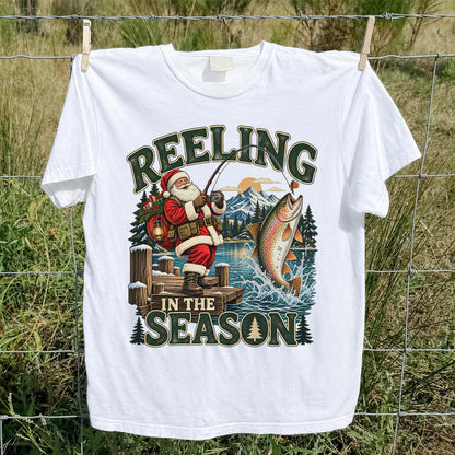 Reeling in the Season Santa Fishing for Rainbow Trout Christmas T-Shirt