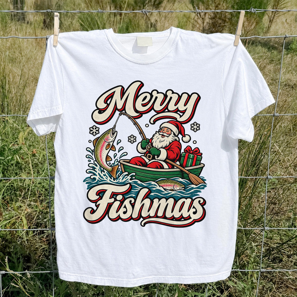 Merry Fishmas Santa Catching Rainbow Trout in a Boat Fishing T-Shirt