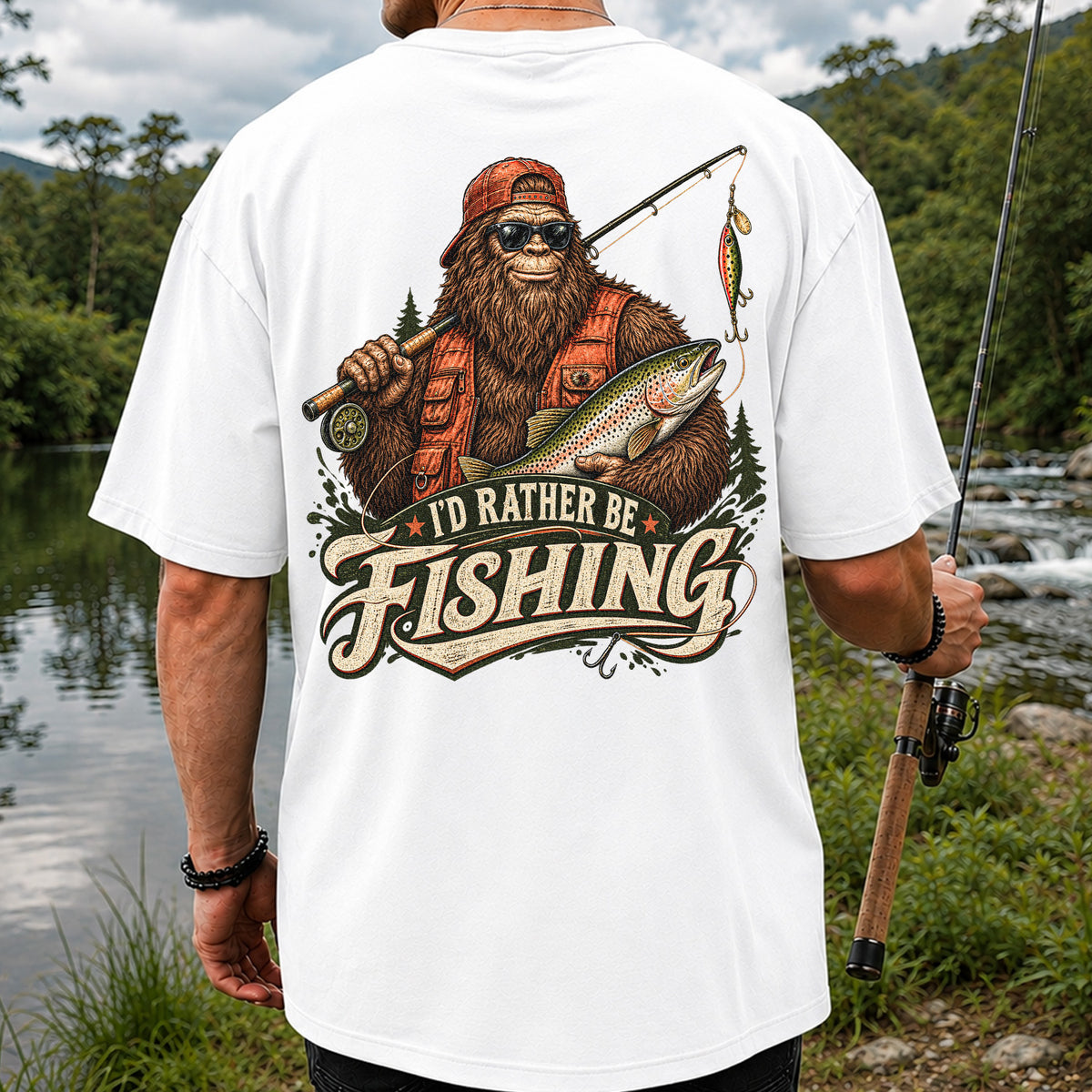 Bigfoot Holding Trout Funny Fishing Graphic T-Shirt | Back Print
