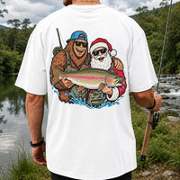 Bigfoot and Santa Holding Rainbow Trout Christmas Fishing Graphic T-Shirt | Back Print