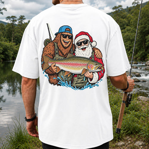 Bigfoot and Santa Holding Rainbow Trout Christmas Fishing Graphic T-Shirt | Back Print